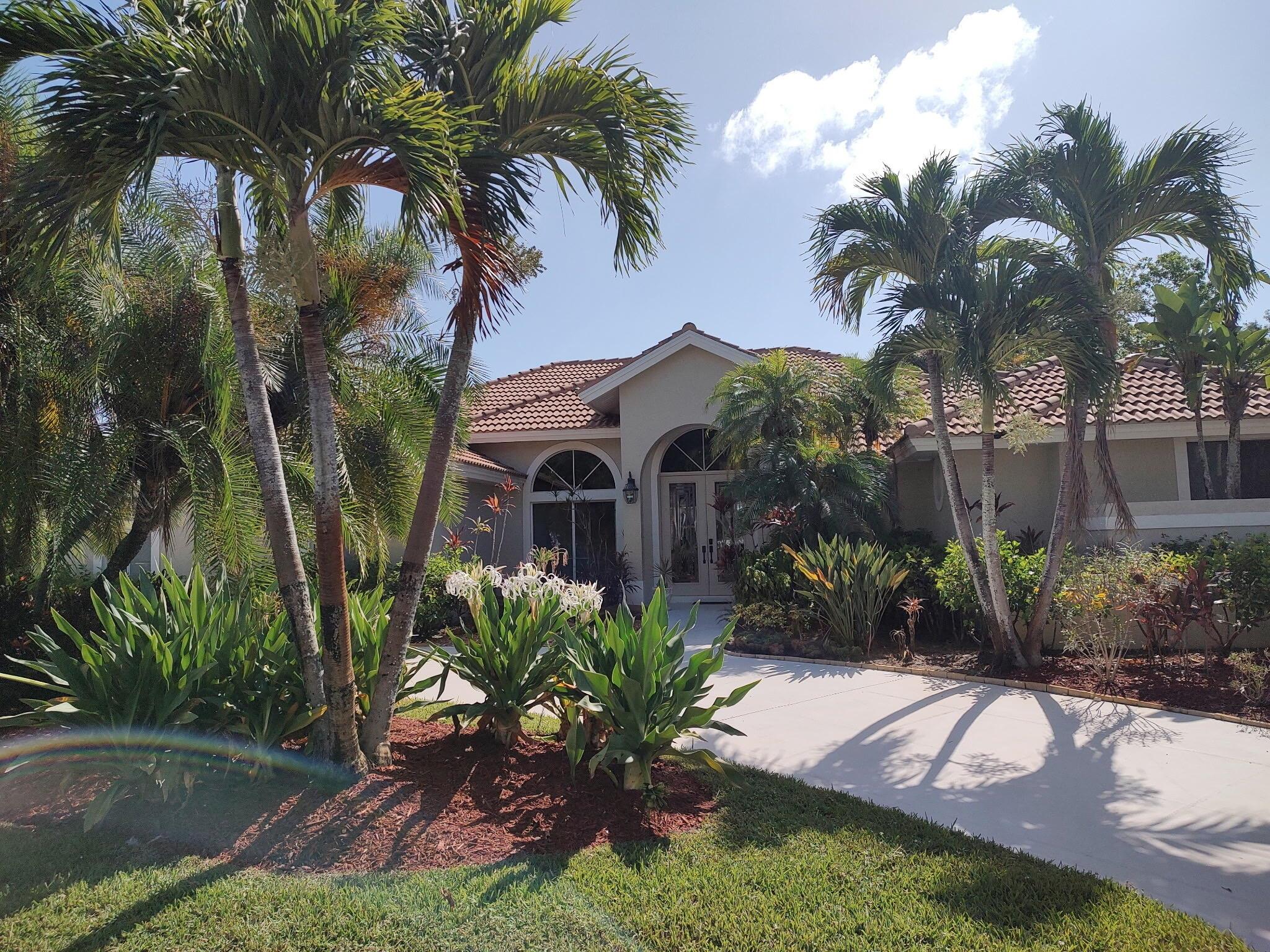 Welcome to one of the finest views at Lost Lake! This could be your dream home in paradise, just 7 miles to either Stuart or Hobe Sound Beach, Golf course on site! Located off of US1 near all the shopping!The view is amazing as soon as you walk through the beautiful double glass door entry way.Spacious split layout featuring two living areas, open kitchen /family room, breakfast nook, private master suite, two large guest rooms with shared bath, one half bath and cabana bath with outside shower. Both master and primary guest have access to oversized lanai which can be fully opened to living area.This spacious home with high ceilings is clean and ready to become your blank canvas. Vacant and easy to see!This lovely grand home is priced to sell!!!
