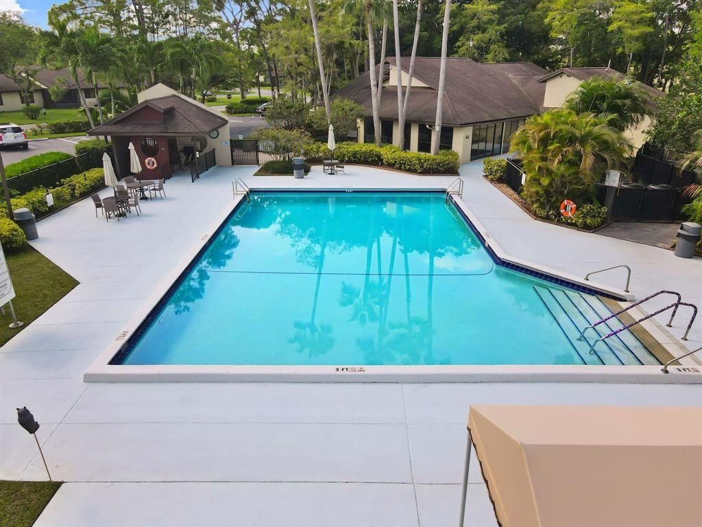 Photo of 64 Macadamia Court, Royal Palm Beach, FL 33411 (MLS # F10545478)