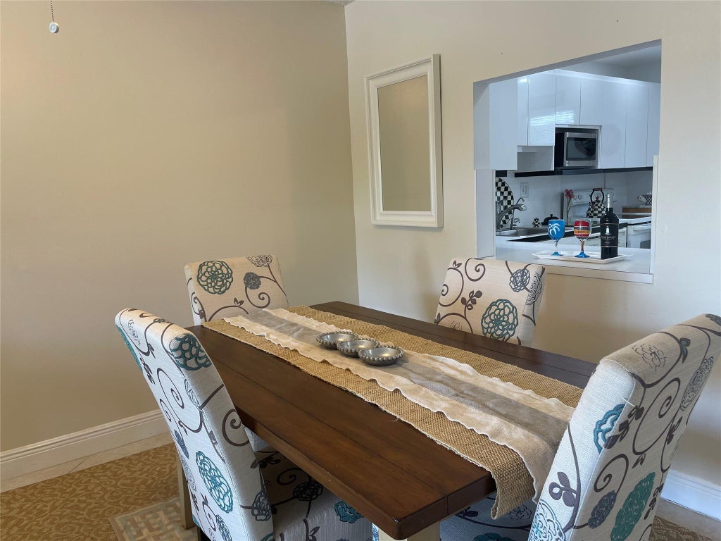 Photo of 4629 Poinciana Street #215, Lauderdale By The Sea, FL 33308 (MLS # F10519413)