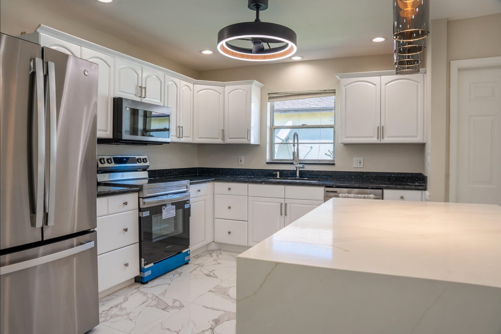 Photo of 20848 CONCORD GREEN Drive W, Boca Raton, FL 33433 (MLS # B26081196)