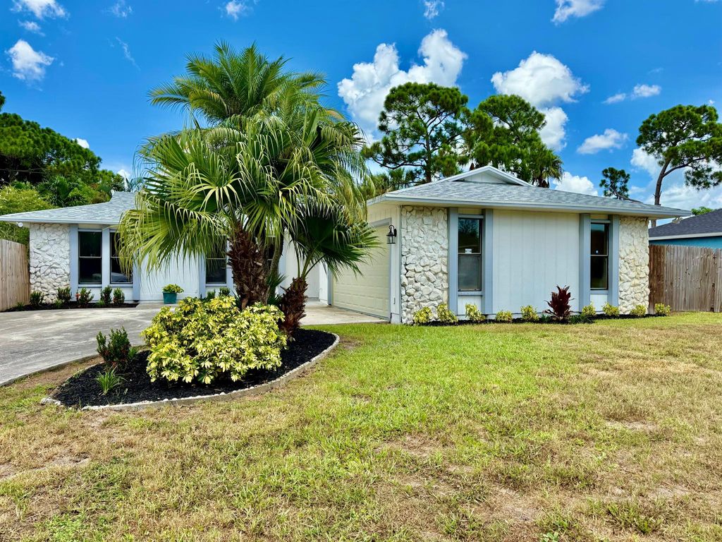 Photo of 118 NW Carmelite Street, Port Saint Lucie, FL 34983 (MLS # R11113311)