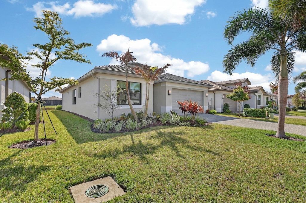 Photo of 12719 SW Blue Mangrove Parkway, Port Saint Lucie, FL 34987 (MLS # B26012918)