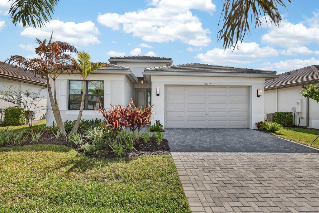 Photo of 12719 SW Blue Mangrove Parkway, Port Saint Lucie, FL 34987 (MLS # B26012918)