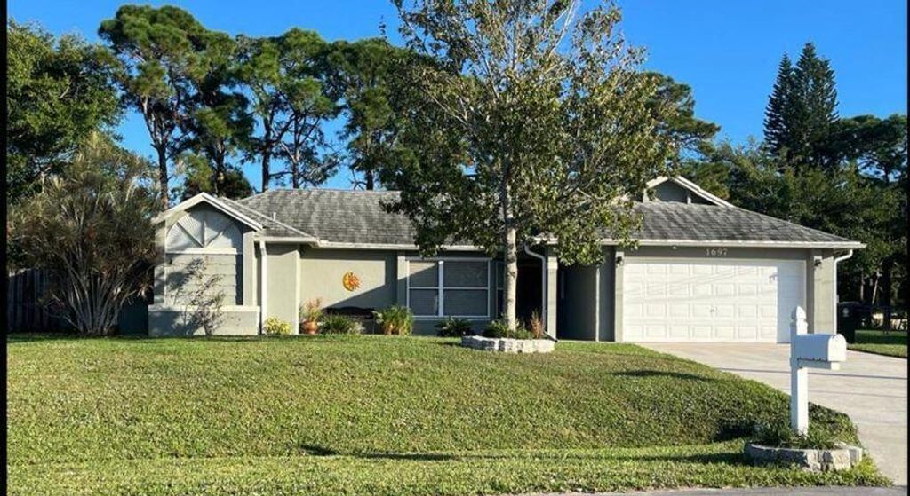 Photo of 1697 SW Clover Street, Port Saint Lucie, FL 34953 (MLS # R11118695)