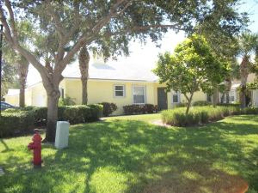 Shows like a model, great 3 bedroom 2 full bath Villa in a gated secure community.The villa is a corner unit, with large open green space out your front door and One of the only 2 garage units. Truly turn key,no upgrades needed,  tile in living area ,high quality wood like flooring in bedrooms. Costume vanity in master bedroom