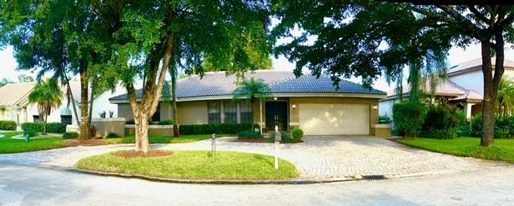 Photo of 4717 NW 58th Ter, Coral Springs, FL 33067 (MLS # F10311366)