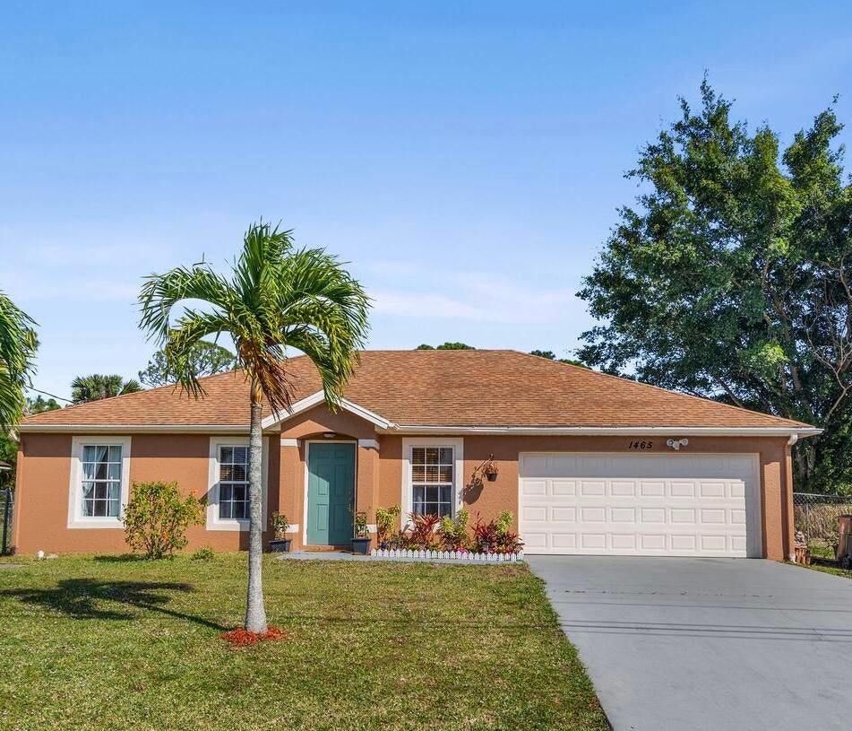 Photo of 1465 SW Vicuna Lane, Port Saint Lucie, FL 34953 (MLS # R10959885)