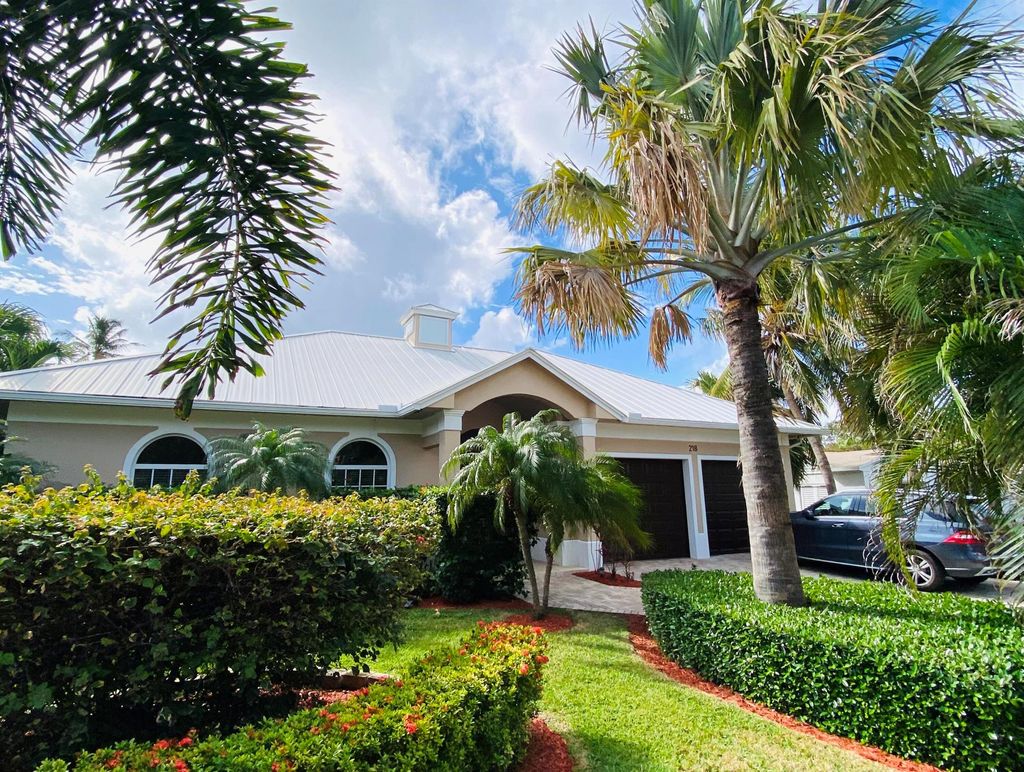 Photo of 218 Sandal Lane, Palm Beach Shores, FL 33404 (MLS # R10948945)