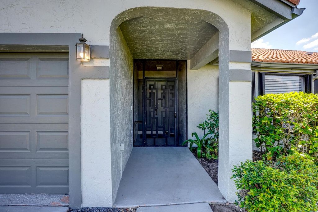 Photo of 5637 Egret Isle Trail, Lake Worth, FL 33467 (MLS # R11143134)