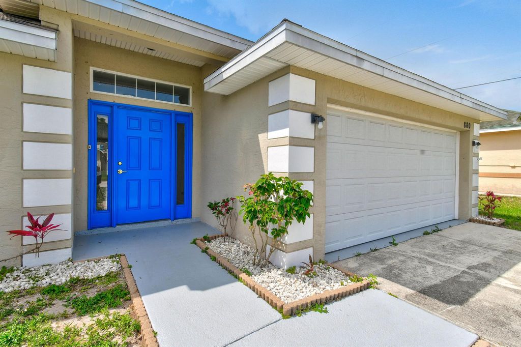 Photo of 880 SW Jennifer Terrace, Port Saint Lucie, FL 34953 (MLS # R11092147)