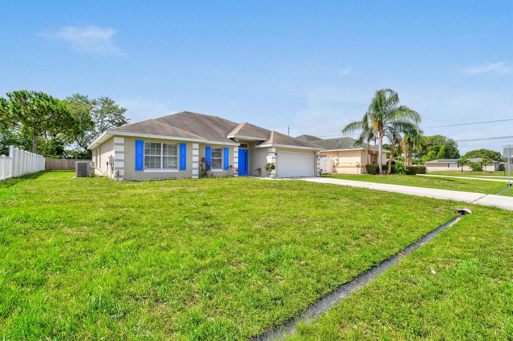 Photo of 880 SW Jennifer Terrace, Port Saint Lucie, FL 34953 (MLS # R11092147)