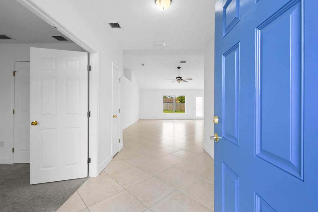 Photo of 880 SW Jennifer Terrace, Port Saint Lucie, FL 34953 (MLS # R11092147)