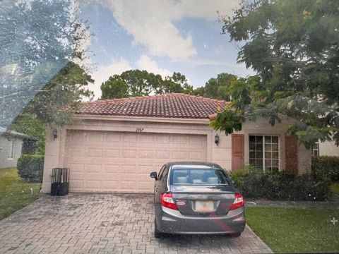 Photo of 1967 SW Newport Isles Boulevard, Port Saint Lucie, FL 34953 (MLS # B26012140)