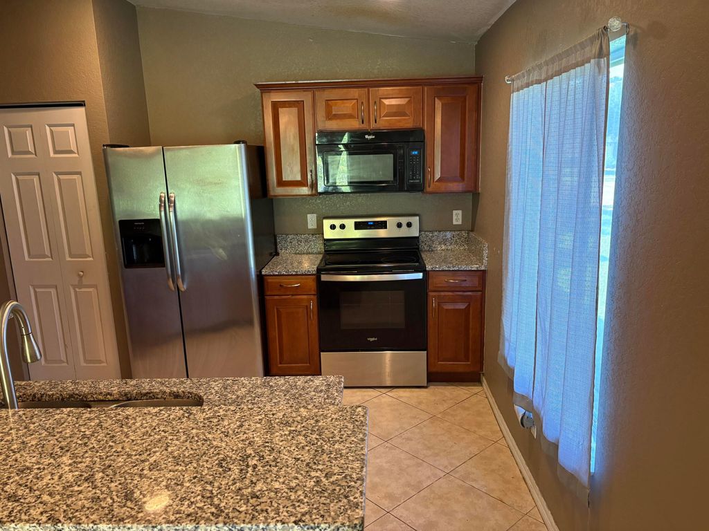 Photo of 1967 SW Newport Isles Boulevard, Port Saint Lucie, FL 34953 (MLS # B26012140)