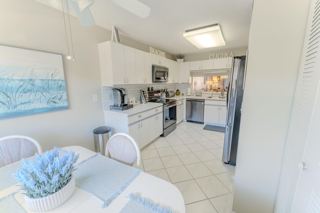 Photo of 4725 E Lucerne Lakes Blvd Boulevard E #203, Lake Worth, FL 33467 (MLS # B26002631)