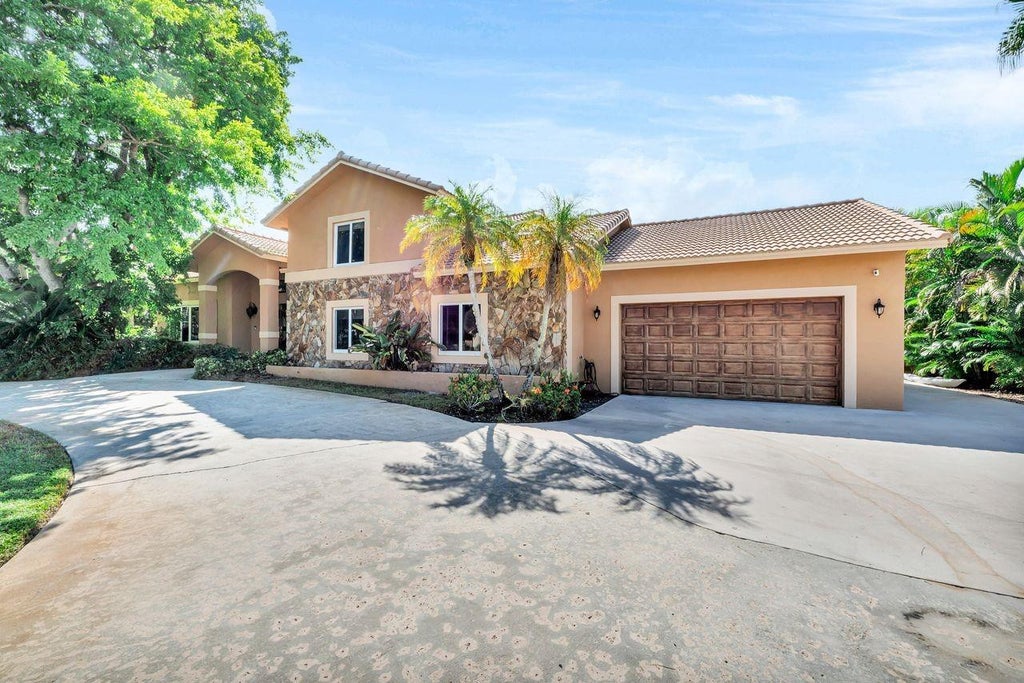 Photo of 11141 NW 26th Drive, Coral Springs, FL 33065 (MLS # F10517420)