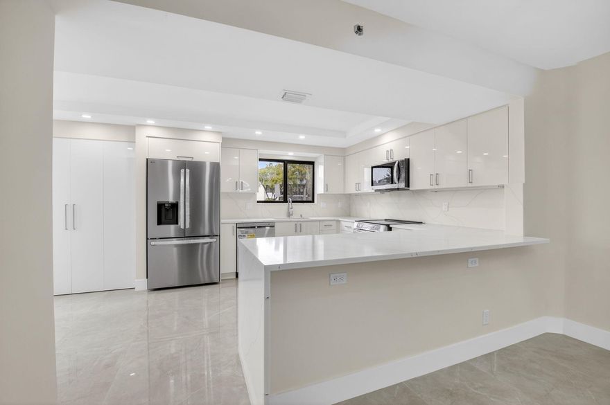 ONE OF THE MOST SOUGHT AFTER MODELS ON FIRST FLOOR OVERLOOKING GOLF COURSE AND 2 MINUTE WALK TO MAIN CLUB HOUSE. CONDO IS IN THE PROCESS OF BEING COMPLETELY UPGRADED AND REMODELED. ALL NEW KITCHEN, OPENED UP INTO LIVING AND DEN AREA. 2 BEDROOMS WITH 2 BATHS COMPLETELY REDONE. NEW LARGE PORCELAIN TILES  THRU OUT. IMPACT WINDOWS THROUGH OUT. all new stainless appliances, all new 
from floor to ceilings, a real must see!!! this condo is in one of the most sought after country clubs with two golf courses, tennis, pickleball, 8 pools, fitness center, spa, 3 restaurants,3 bars, card rooms, and much much more.