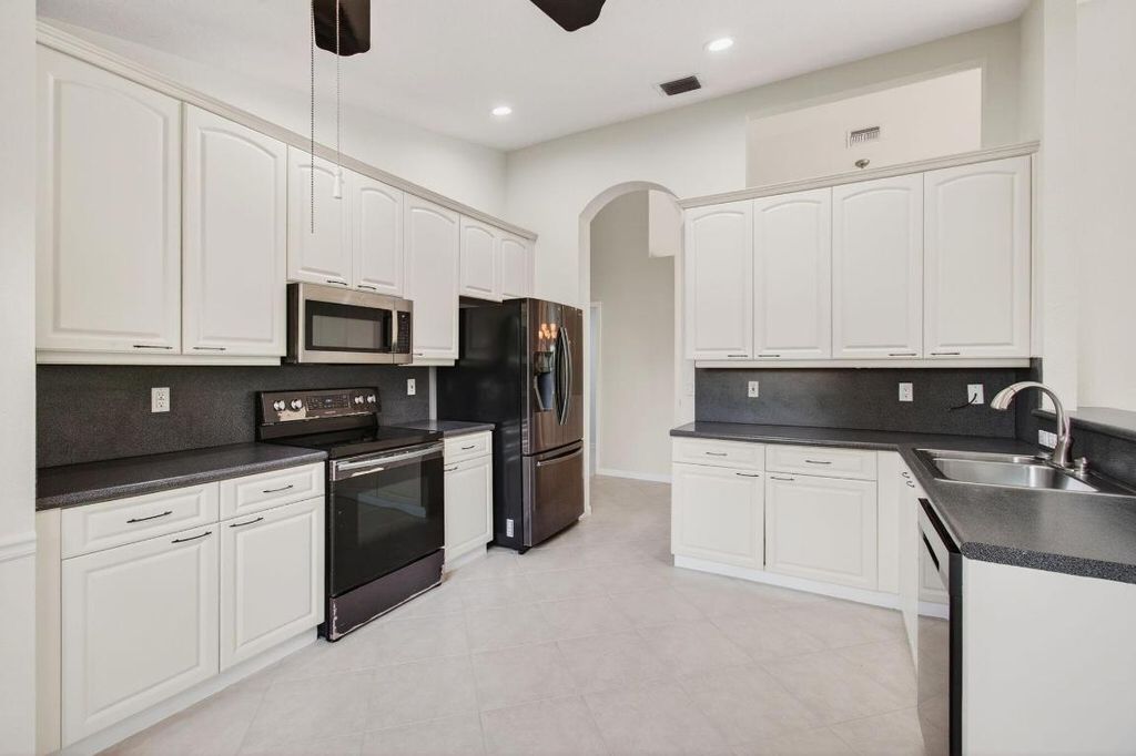 Photo of 7413 Haviland Circle, Boynton Beach, FL 33437 (MLS # R11117604)