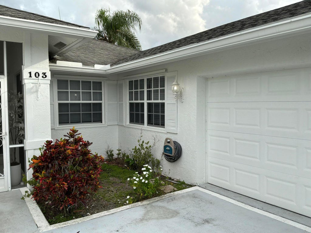 Photo of 103 BROOK WOODE Avenue, Royal Palm Beach, FL 33411 (MLS # B26088438)