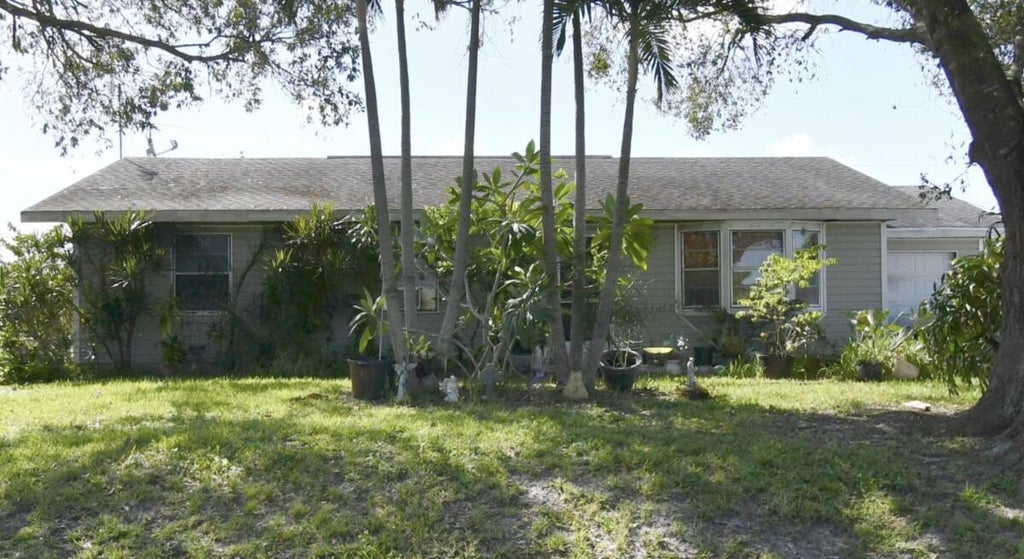 Photo of 420 SW Nativity Terrace, Port Saint Lucie, FL 34984 (MLS # R11040970)