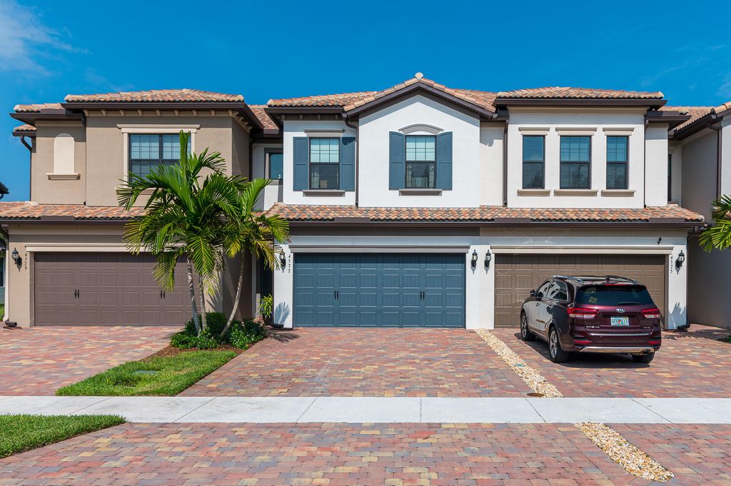 Photo of 4577 San Fratello Circle Cir, Lake Worth Beach, FL 33467 (MLS # R10778808)