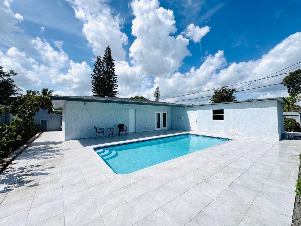 Photo of 1840 NW 1st Way, Pompano Beach, FL 33060 (MLS # B26001175)