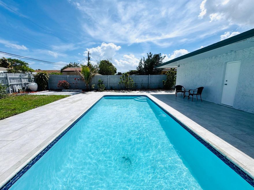 Beautiful 4b/3b pool house located in a quiet neighborhood. close to i95 and dixie highway. NEW roof with permit 3 years old. impact window. fresh paint inside and out. wood kitchen cabinet with granite tops. updated bathroom. big living room. big patio for party. 3/13-3/24 only whatsapp and email works for listing agent.