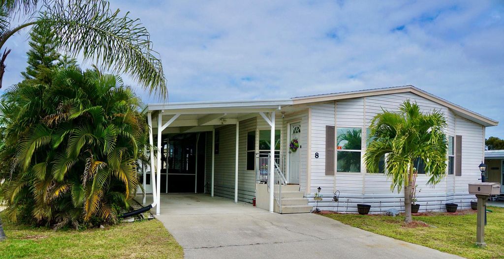 Photo of 8 Andalusia Lane, Port Saint Lucie, FL 34952 (MLS # R11112303)