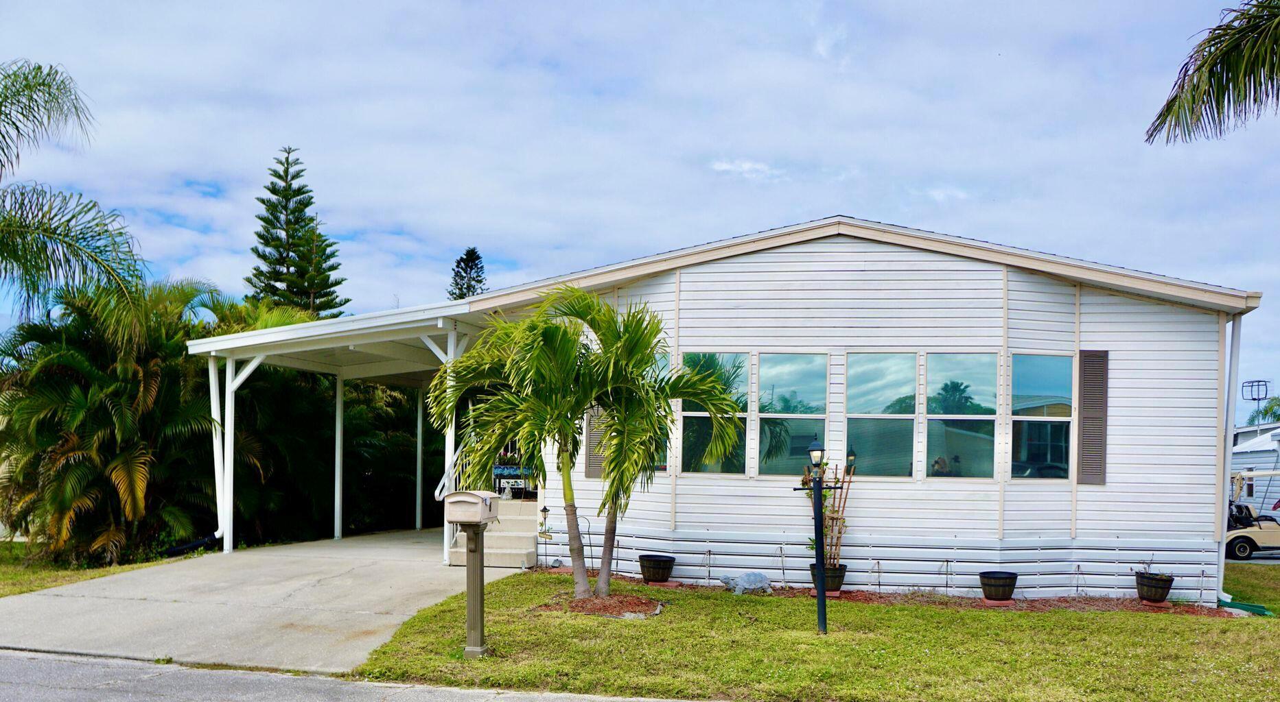 Clean, Maintained, Furnished and Spacious. New Roof in 2022. New AC in 2023. New Hot Water Heater in 2020. All new Stainless Steel Appliances in 2022. This 1560sf home is large enough for the entire family to enjoy making memories together. Serve from this true wet bar and entertain in the large living room or for extra space enjoy grilling and relaxing on your large and private screened porch. The kitchen is wide open for everyone to enjoy and features a large pantry. Overnight guests will enjoy their very own private bathroom! Master Bath is spa-like with Modern Frameless walk in shower and double vanity sinks. Indoor washer and dryer stays with the home. Located on a quiet cul-de-sac street. This home has it all! Call for a private showing today. This is your Florida Dream!