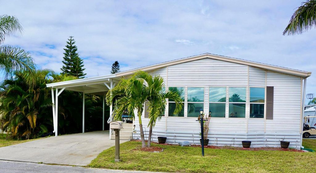 Photo of 8 Andalusia Lane, Port Saint Lucie, FL 34952 (MLS # R11112303)