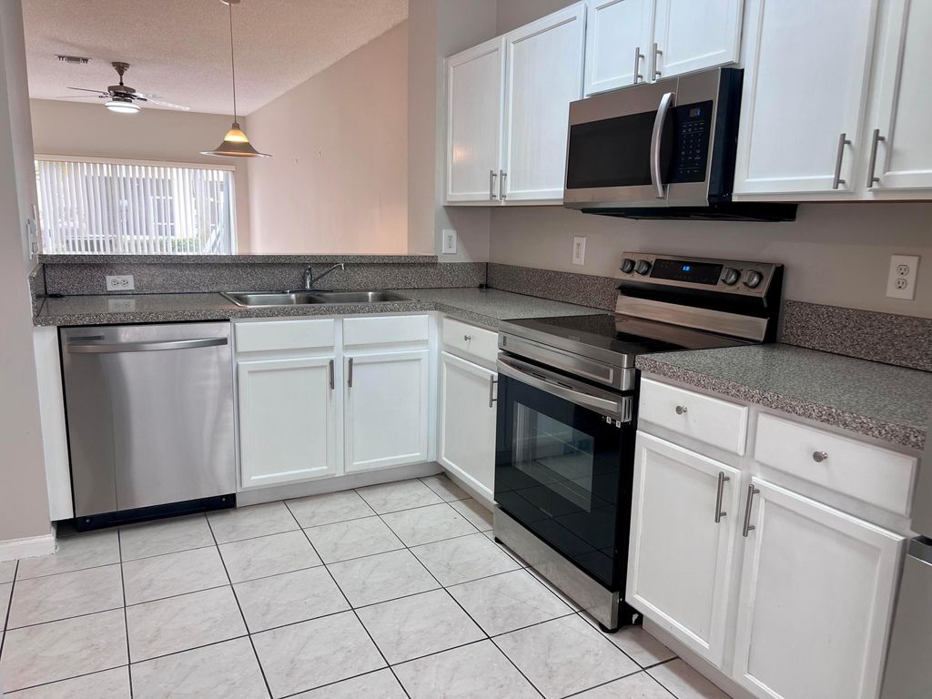 Photo of 6952 Crooked Fence Drive, Lake Worth, FL 33467 (MLS # R11021173)