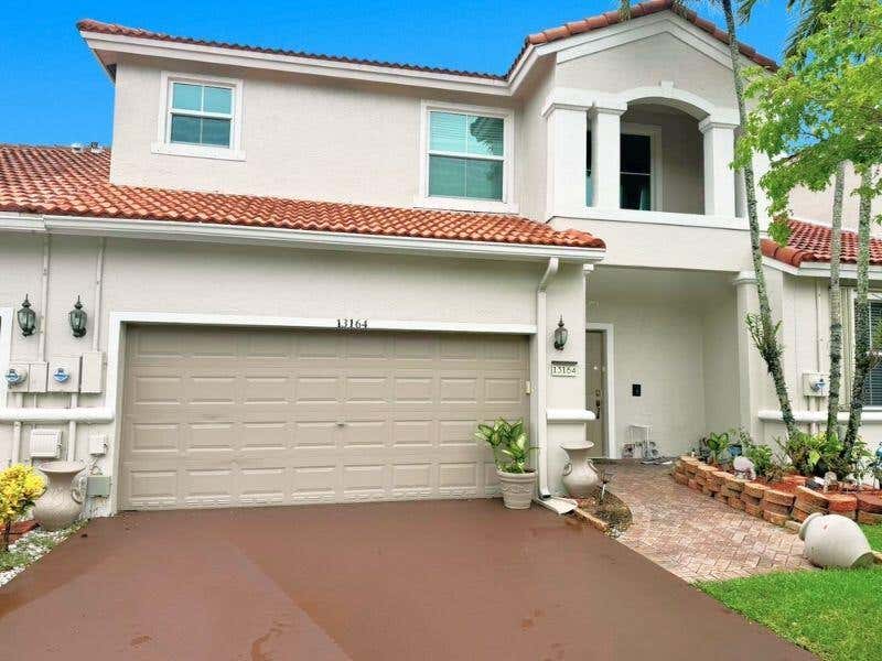 Photo of 13164 NW 9TH Court, Pembroke Pines, FL 33028 (MLS # B26061733)