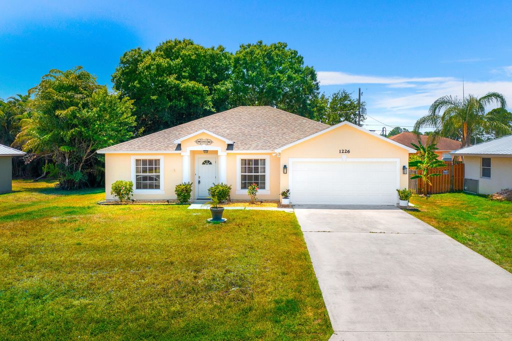 Photo of 1226 SW Asturia Avenue, Port Saint Lucie, FL 34953 (MLS # R10986695)