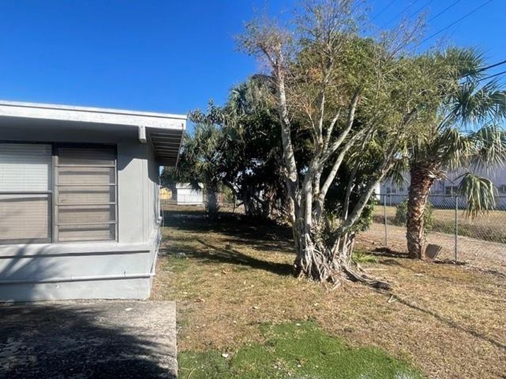 Photo of 1129 W 23rd Street, Riviera Beach, FL 33404 (MLS # F10555036)