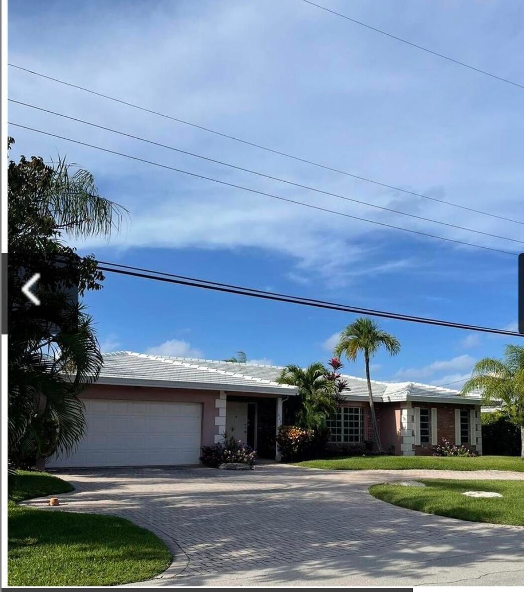 Photo of 823 N Forsyth Street E, Boca Raton, FL 33487 (MLS # R11162929)