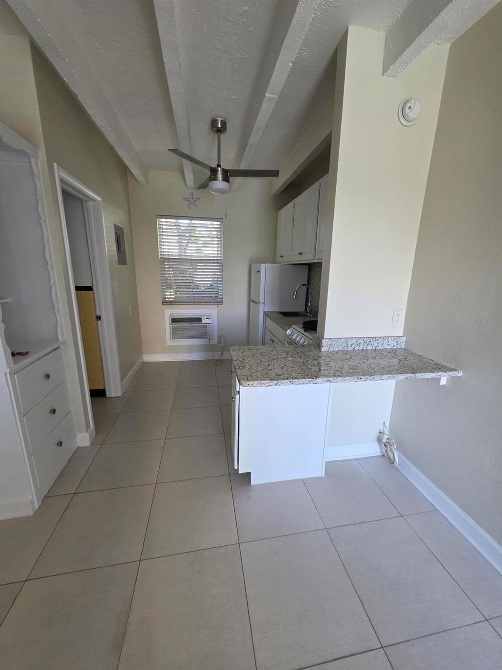 Photo of 100 Cascade Lane #4, Palm Beach Shores, FL 33404 (MLS # R11137731)