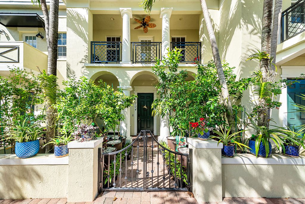 Photo of 704 NW 83rd Place, Boca Raton, FL 33487 (MLS # B26000232)