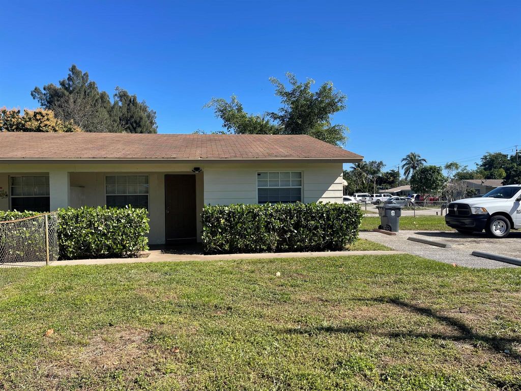 Photo of 4856 S 32nd Drive, Lake Worth, FL 33461 (MLS # R10955468)