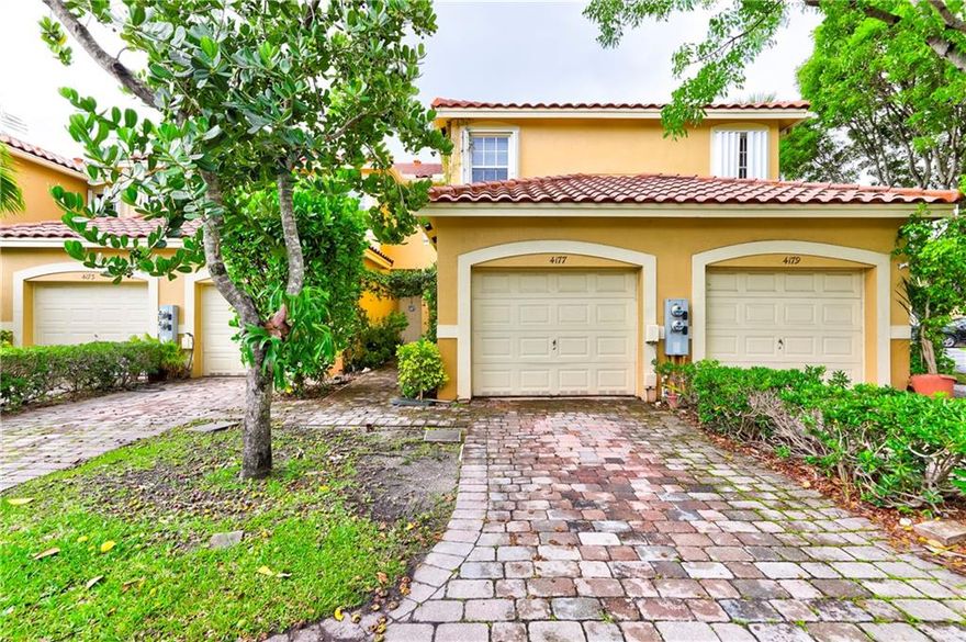 PRICE REDUCED!! DO NOT MISS OUT!! THIS IS THE ONE!!  3 bedrooms, 2.5 baths 1 car garage townhouse. This unit has a lot to offer!! Tastefully updated kitchen with open floor plan and granite counter top. Bright and spacious with lots of natural light. NO CARPETS!! Tile and laminate flooring. Washer and dryer in the garage. Enjoy a pool view from your private screened in patio. Located in a well desired San Brianna all age community. Conveniently located close to everything, minutes to the beach, shopping and dinning. Heated pool and hot tub. Well maintained community with reserve funds. MUST SEE!! YOU WILL LOVE LIVING HERE!!