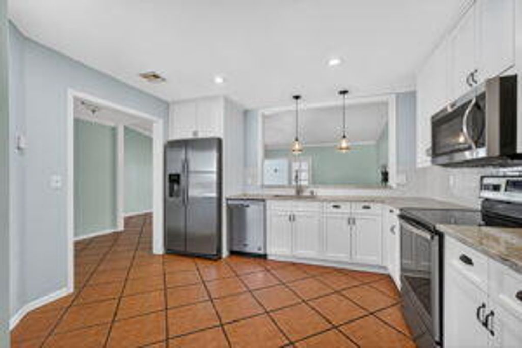 Photo of 8064 SE Carlton Street, Hobe Sound, FL 33455 (MLS # R11136992)