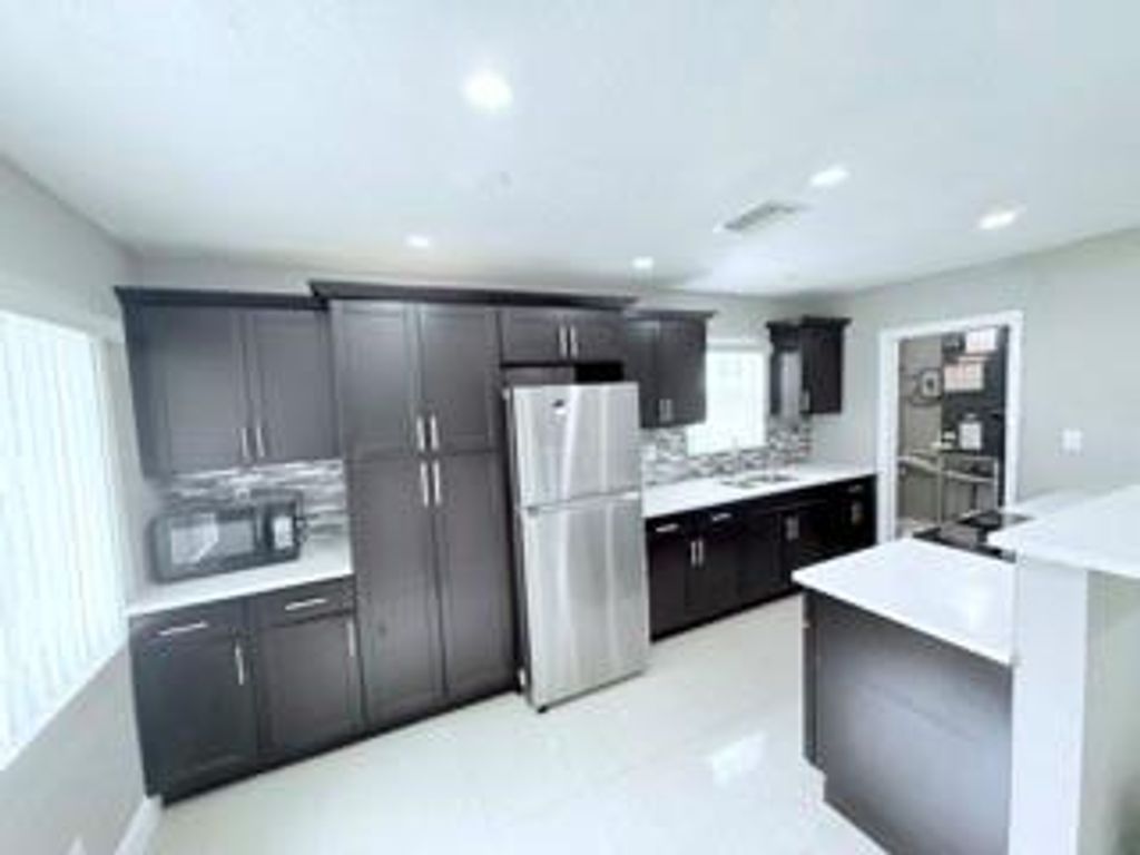 Photo of 2710 NW 24th Avenue, Fort Lauderdale, FL 33311 (MLS # F10496787)