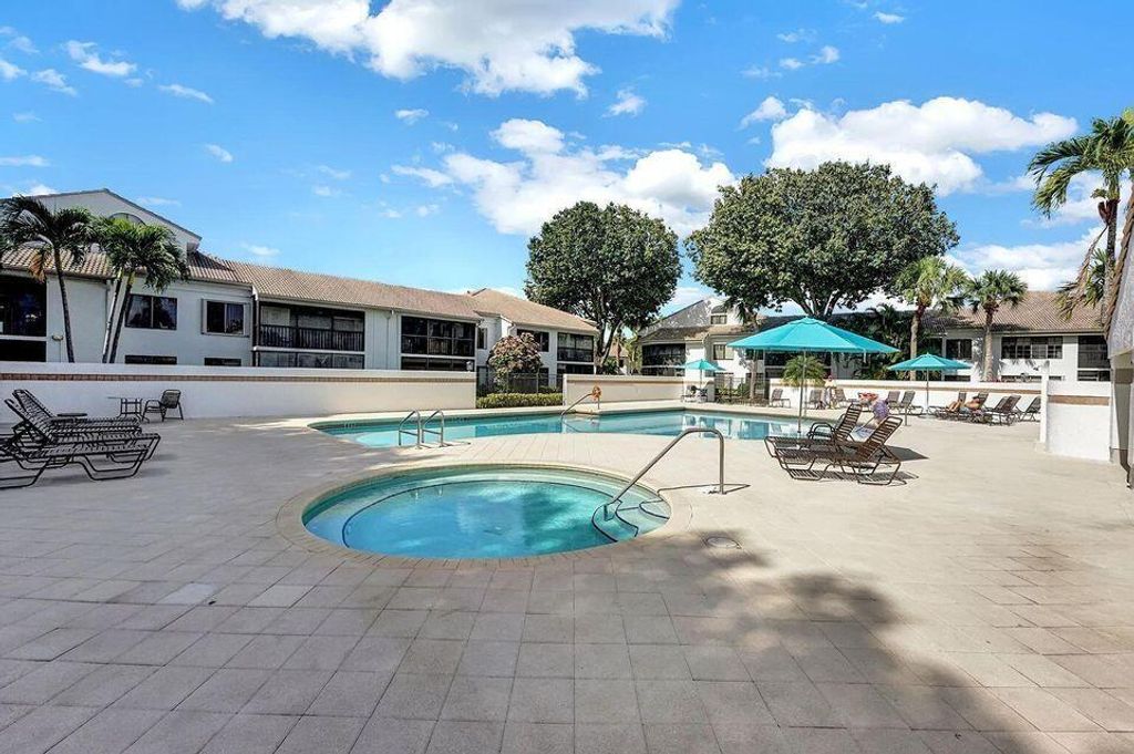 Photo of 7449 Glendevon Lane #106, Delray Beach, FL 33446 (MLS # B26007605)