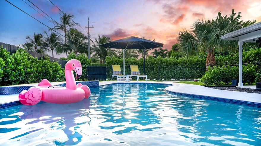 Enjoy the ultimate family vacation at this luxury home in the prestigious Lake Ida neighborhood of Delray Beach.  Just 7 min drive to the beach and Atlantic Avenue. Easy access to top restaurants in world famous Atlantic Ave., golf, and other attractions. This spacious 4-bedroom, 2-bath home features a heated salt pool, fast WIFI, covered patio and a half court basketball court. The private and fenced backyard. Inside, enjoy a pristine interior with a fully stocked kitchen, plush luxury bedding, and thoughtful touches for a relaxing stay.
This home embodies the classic Florida charm and lifestyle with timeless allure of Atlantic Ave, seamlessly blending classic charm with modern luxury.  Treat yourself to 5 Star luxury and hospitality!