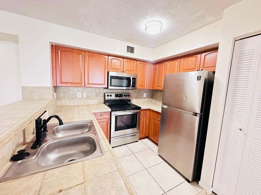 Photo of 1733 Village Boulevard #206, West Palm Beach, FL 33409 (MLS # F10429838)
