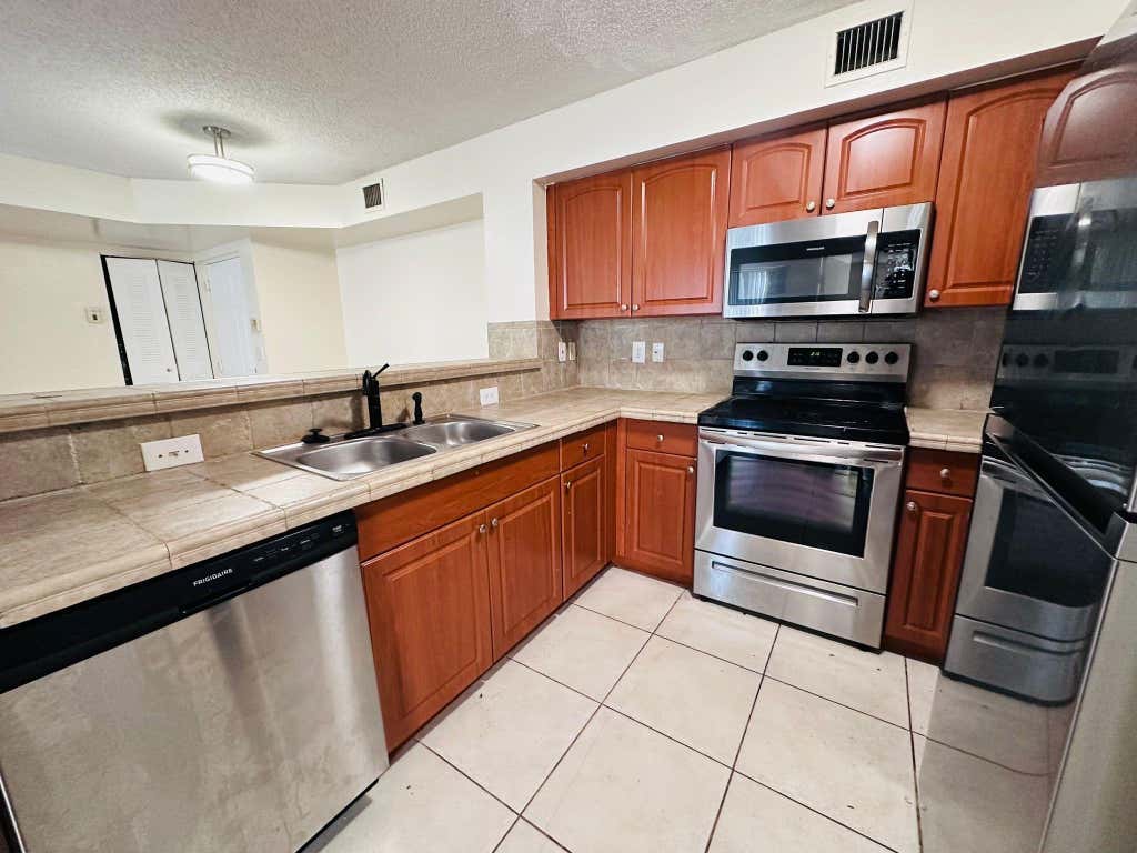 Photo of 1733 Village Boulevard #206, West Palm Beach, FL 33409 (MLS # F10429838)