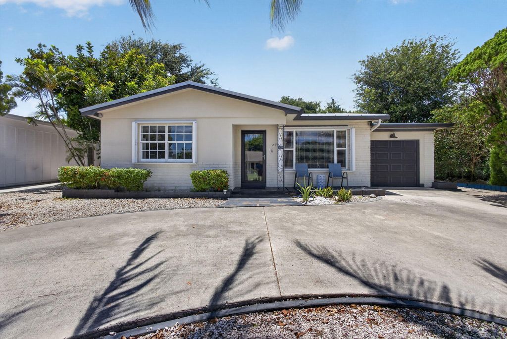 Photo of 1964 Circle Drive, North Palm Beach, FL 33408 (MLS # B26031473)