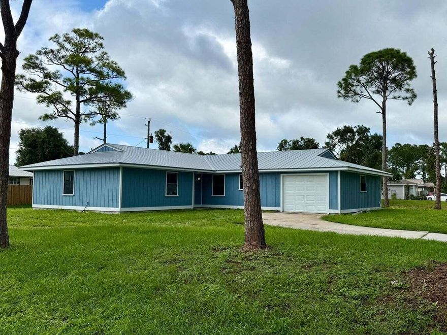 Discover the potential in this 3-bedroom, 2-bath single-family home with a 1-car garage, perfectly situated on a desirable corner lot in Fort Pierce. Featuring a brand-new 2024 metal roof and a new A/C system, the big-ticket items are already taken care of. Inside, you'll find a spacious floor plan that's ready for your personal touch--just a little love will transform this property into the perfect place to call home. Whether you're a buyer looking to customize your dream home or an investor searching for a fantastic opportunity, this property is priced right for a quick sale. Don't miss your chance to add value and enjoy the benefits of ownership in a growing area.