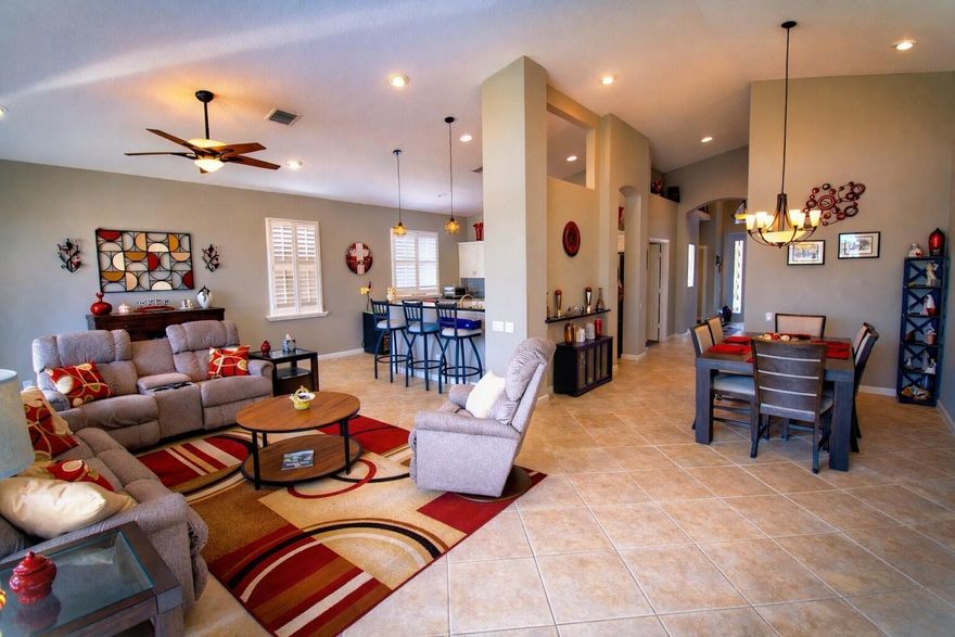 Meticulously maintained open "Sapphire" floorplan w/serene water view. 2BD/2BA w/flex room. Kitchen updated w/granite counters, new appliances, shaker style cabinets & a snack bar. Main areas, incl flex room have tile on the diagonal. Master & Guest Bedrooms have LPV flooring.  New Reverse Osmosis & filtration to kitchen sink and refrigerator. Hot water circulator in master bath. Large, screened lanai w/all new screening; accordion storm shutters, except front door. Gas Grill & Living room TV convey. Water Heater 12/2021; AC 06/2018. Cascades is an "active" 55+ community offering a wonderful lifestyle-large clubhouse w/billiards, gym, library & more, resort style pool/spa, tennis, pickleball, golf, shuffleboard, tennis, etc.  Roof cleaned every 6 months on service plan; Generator has 10 yr warranty as of 02/2026. Plantation shutters; updated ceiling fans & lighting; all new wall switches and receptacles. All new sink faucets and pop-up drains in bathrooms; new shower valve in master bath; retractable front entry screen on entry door; Extra storage shelving in laundry room & garage; pull down steps in garage to attic storage; pull out shelving in baths & kitchen cabinets; garbage can storage outside.