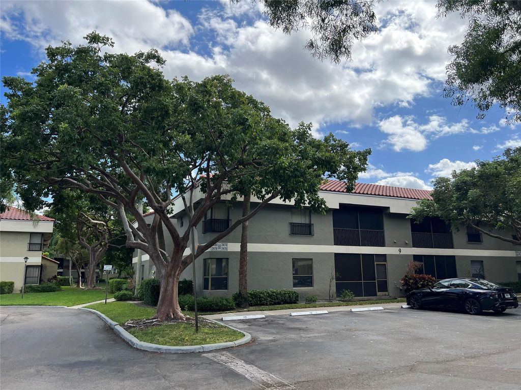 Photo of 2479 NW 49th Ter #771, Coconut Creek, FL 33063 (MLS # F10532514)