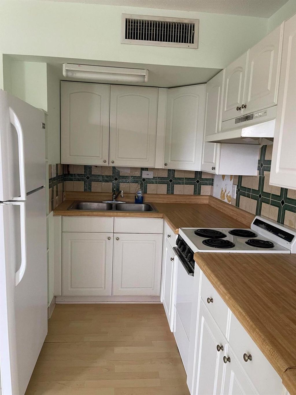 Photo of 1200 Colonnades Drive #205, Hutchinson Island, FL 34949 (MLS # R10935525)